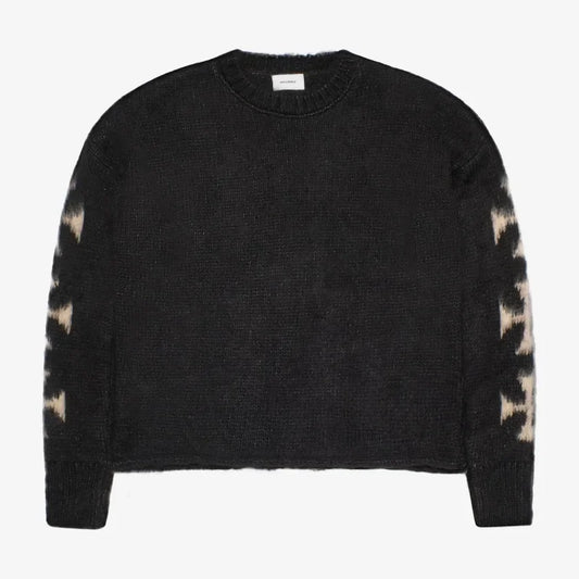 Cross sleeved sweater