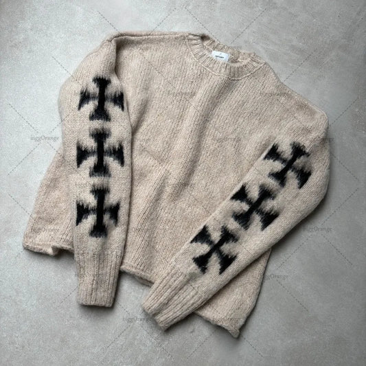 Cross sleeved sweater